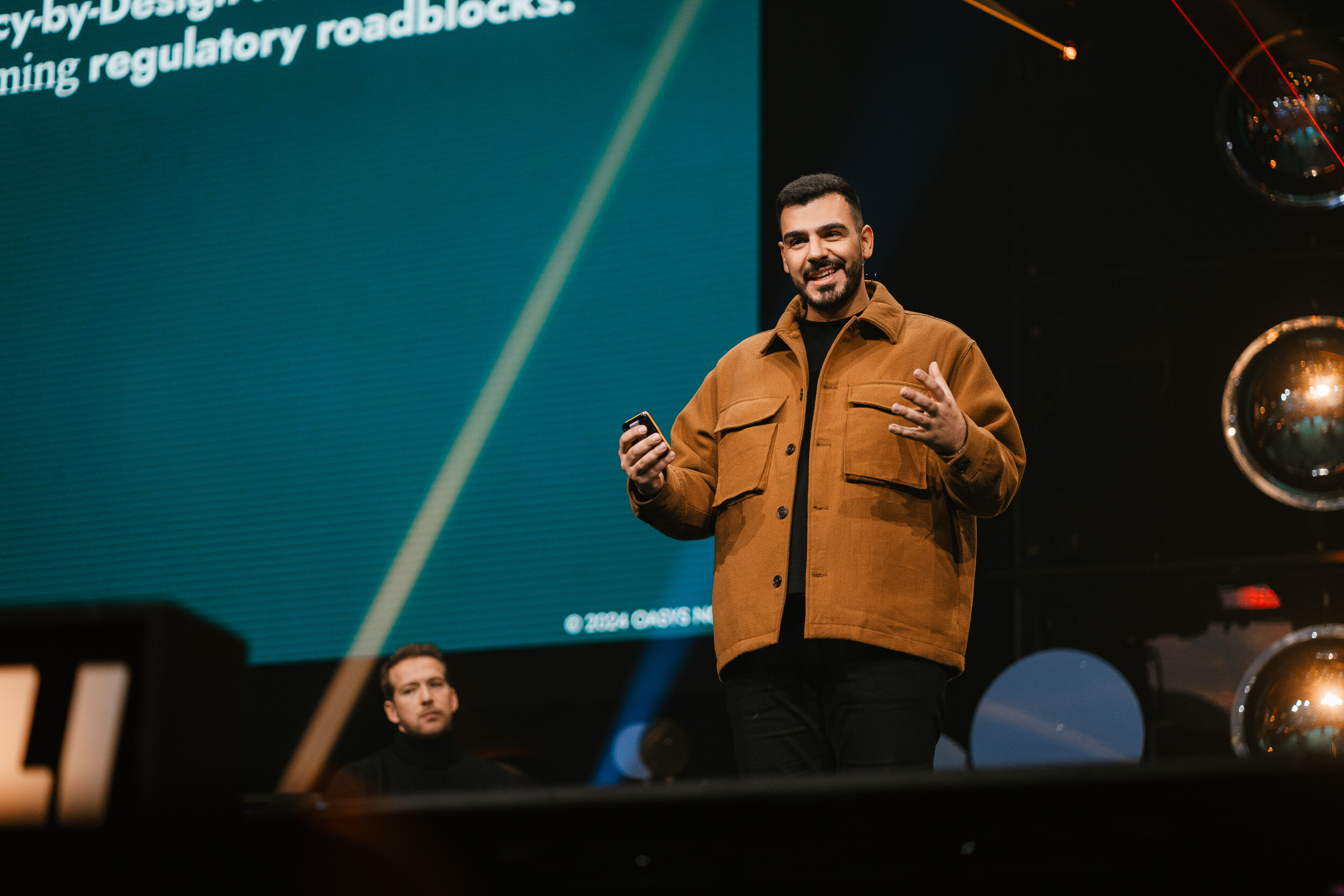 Nima Salami pitching at slush 100 competition