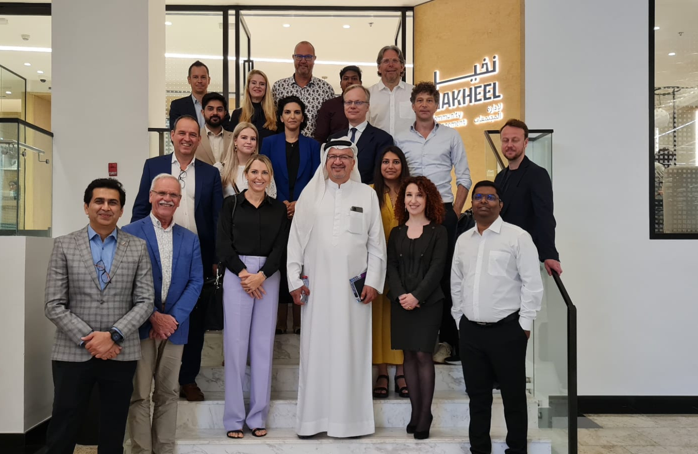 cluster members pose with partners from the gulf region in a group picture