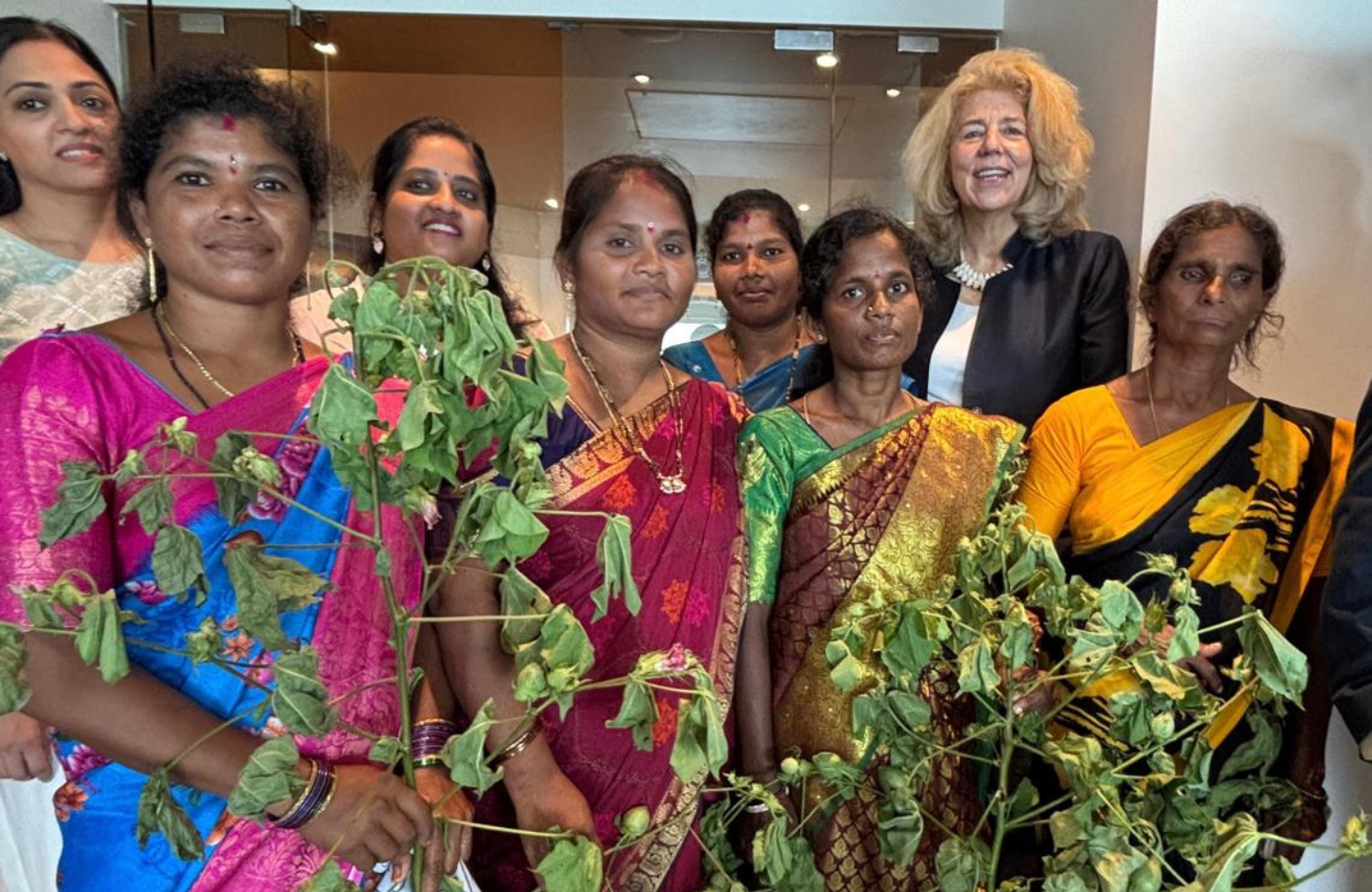 The Ambassador of the Netherlands to India along with a group of female coffee and cotton farmers in Andhra Pradesh 