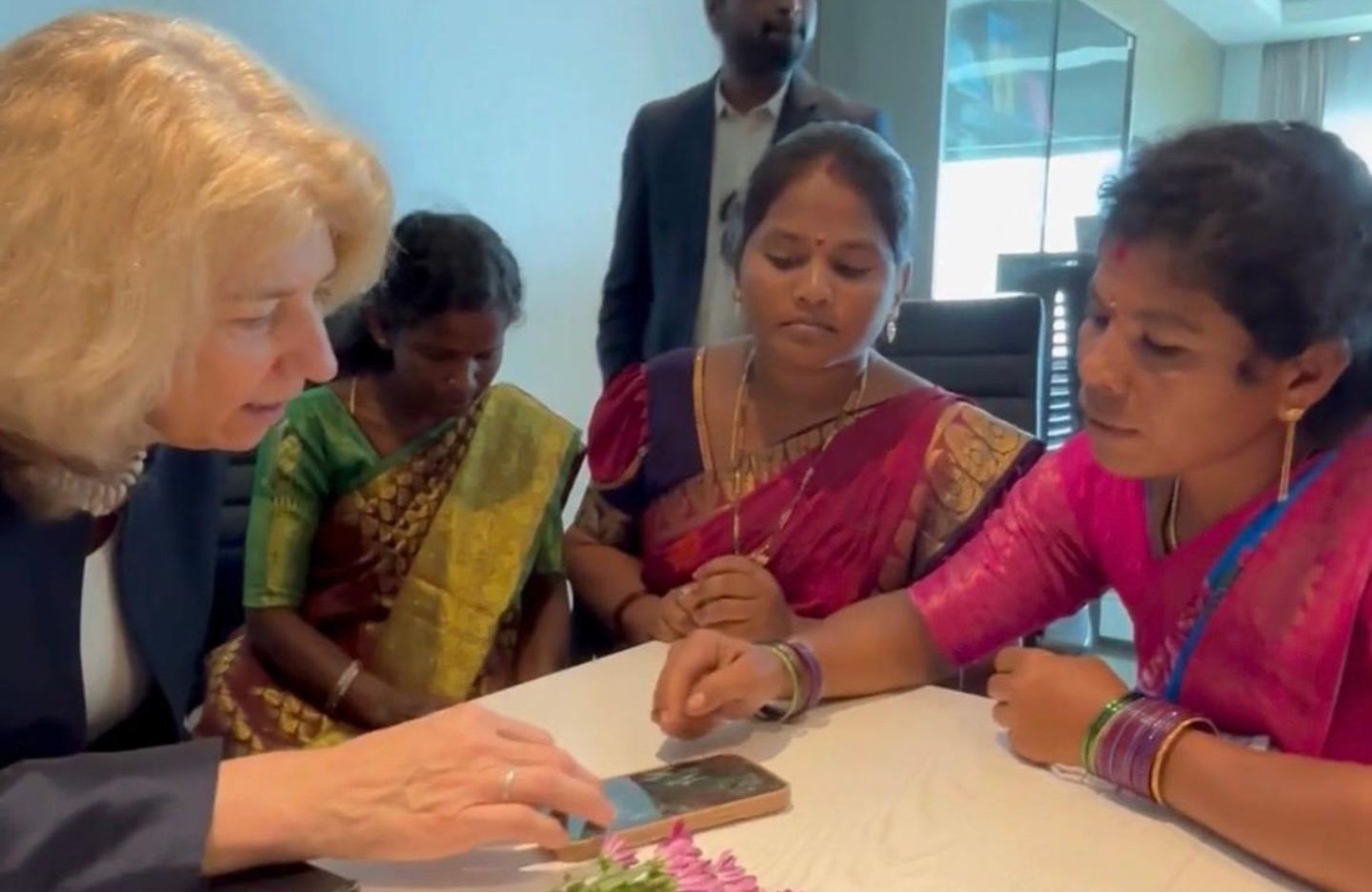 The Ambassador of the Netherlands to India along with a group of female coffee and cotton farmers in Andhra Pradesh 