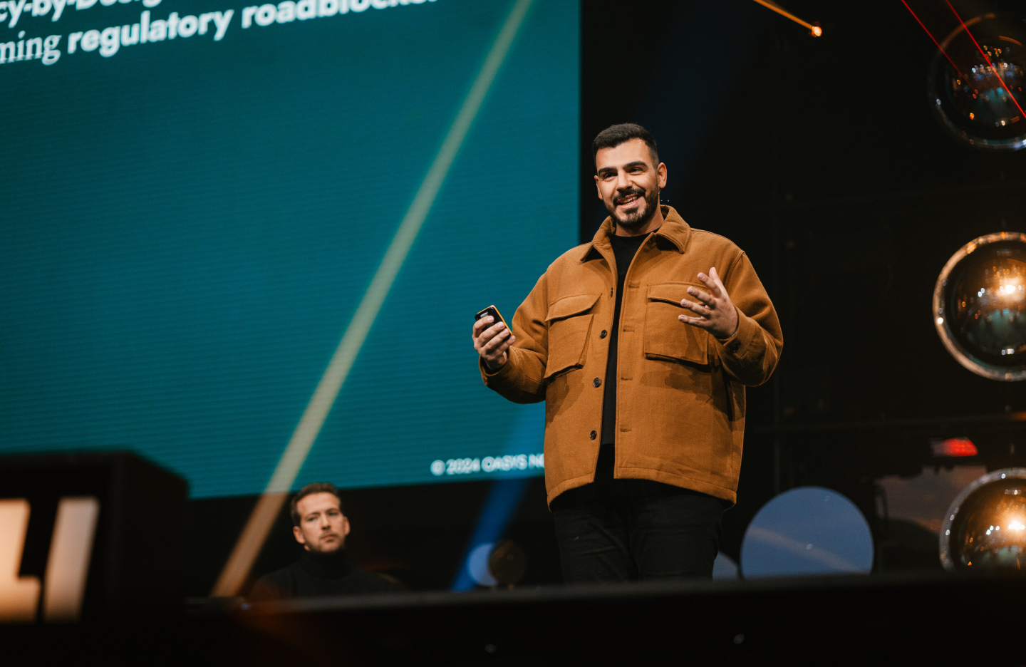 Nima Salami pitching at slush 100 competition