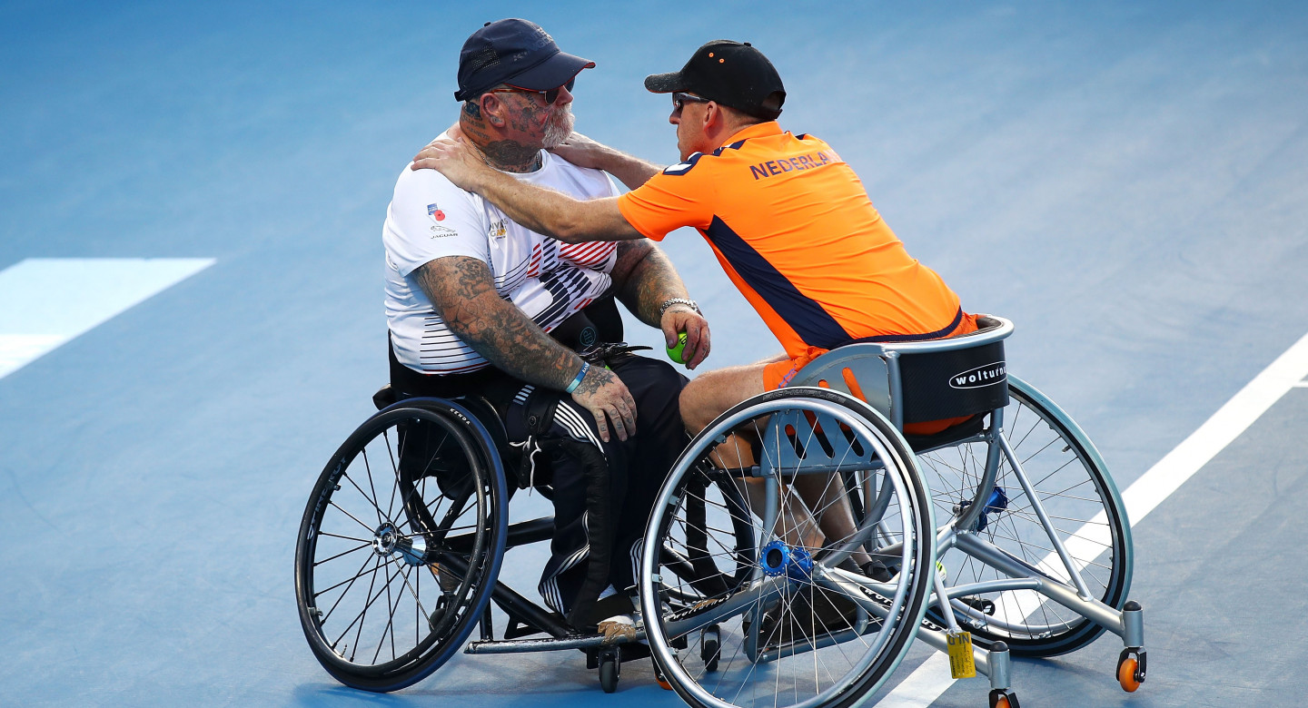 Invictus Games athletes on wheelchairs on tennis court 