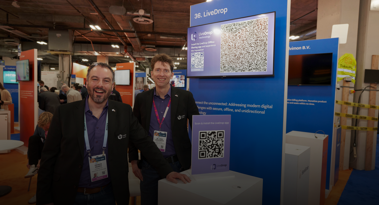 Cofounders of LiveDrop at their stand at CES 2024