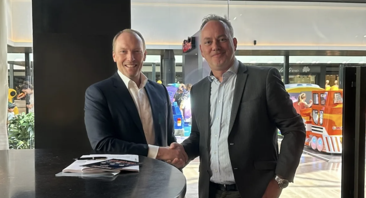 CEO at aXite Security Tools and Co-founder & CEO at DTACT shaking hands