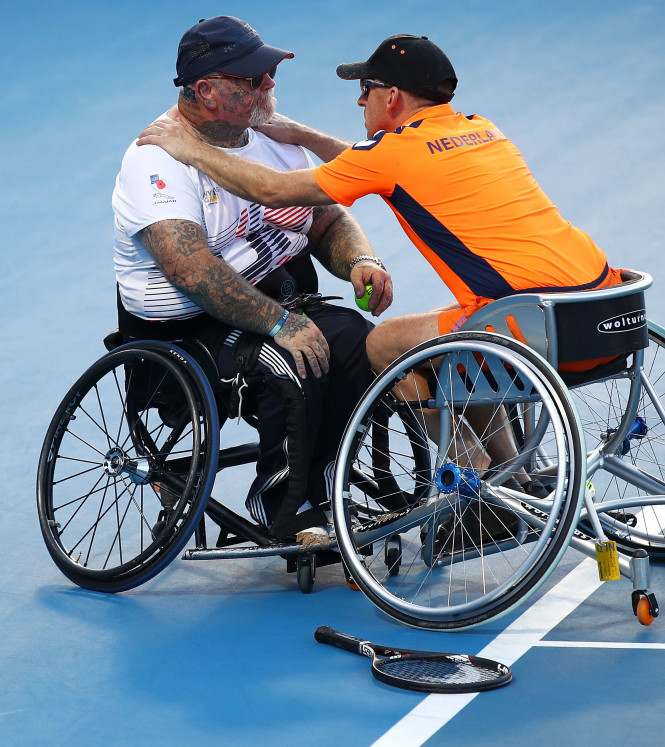 Invictus Games athletes on wheelchairs on tennis court 