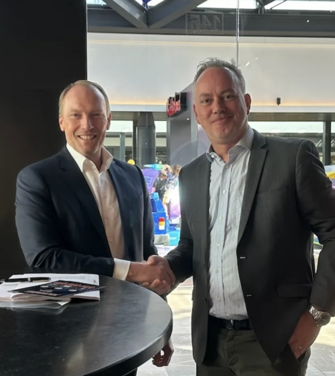CEO at aXite Security Tools and Co-founder & CEO at DTACT shaking hands