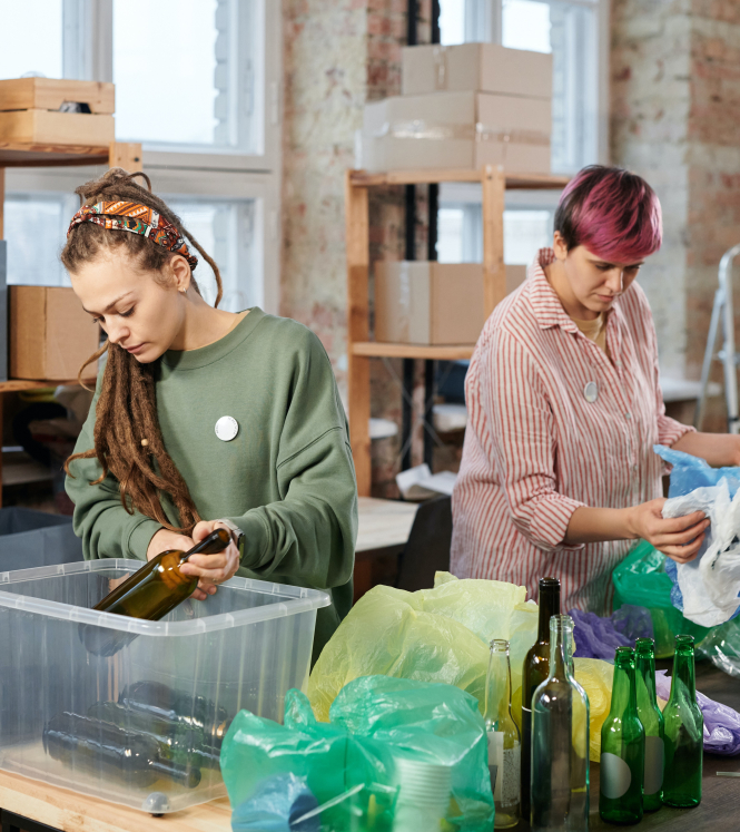 women sorting recyclables photo Julia M. Cameron/pexels