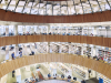 The forum library of Wageningen University. People walk around between floors